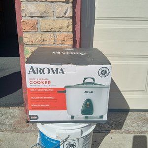 One is a Closetmaid shelf rack the other one is Aroma Rice and Grain Cooker